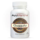 Guggulu Tablets bottle front label close-up on white background, 90 tablets, AyuMantra.